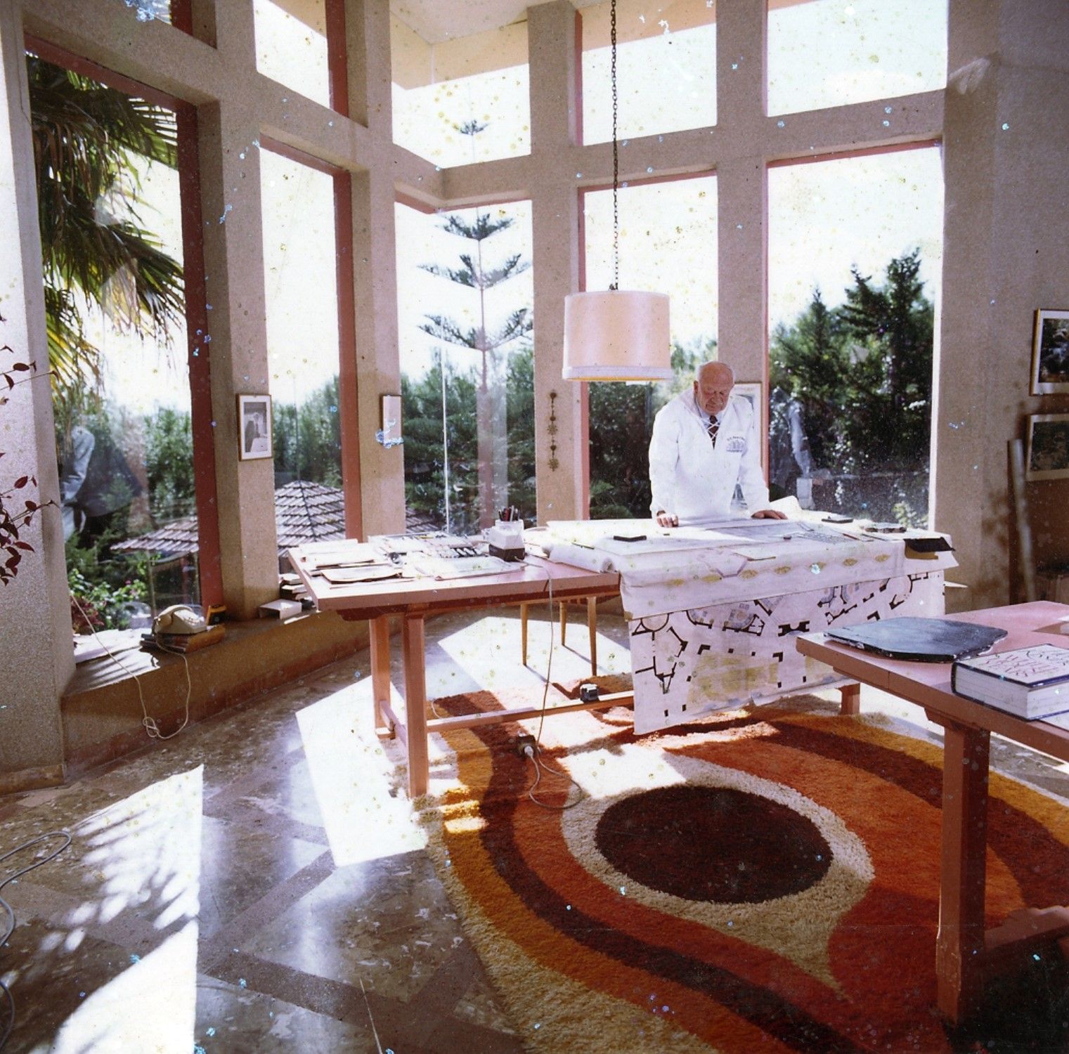 Robert Mosher, working on some plans at his house in Nagüeles, in Marbella.