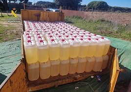 Fuel canisters seized in the police raid.