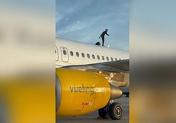 Valencia airport incident: Man climbs onto roof of Vueling plane and delays flight