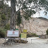 The barrier and warning signs at the Río Chillar in Nerja
