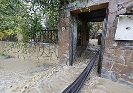 A flooded house in the hamlet of La Indiana.