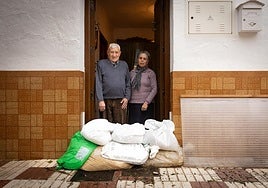 Isabel and Salvador at the door of their house in the village of Almargen.