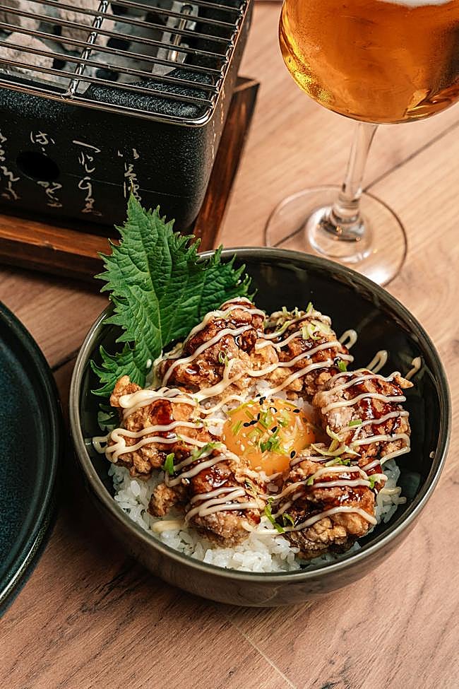 Karaagedon: crisp, juicy Japanese fried chicken served on imported rice with an egg to mix in to taste.