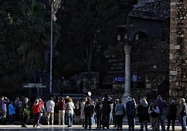 Tourists on their guided tours of Malaga city's Alcazaba.
