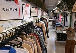 Clothes from the Chinese brand Shein in a shop.