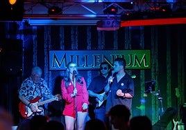 Steve Hughes (l) on stage with some of the performers at the fundraiser in Mijas.