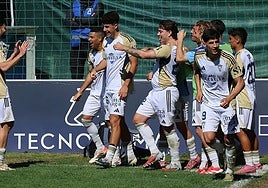 The Marbella players celebrate one of their four goals against Algeciras.