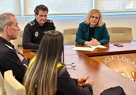 Ana Mula with officers from the VioGen unit.