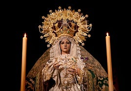 La Virgen de la Esperanza, dressed in traditional attire, ready for the procession.