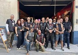 Members and supporters of the Wolfmen MC Spain chapter outside their clubhouse in Alhaurín el Grande.