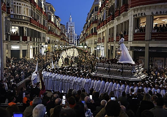 Jesús Cautivo making his way down Calle Larios after passing the official grandstand.