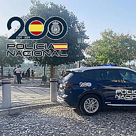 A National Police car at the Albaicín viewpoint in Granada.
