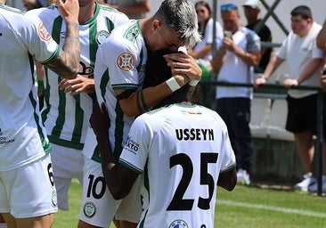 The Torremolinos players celebrate the equalising goal against Atlético B.