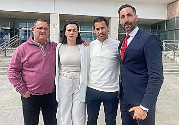 Carmen with her family and lawyer in front of the courthouse in Malaga.