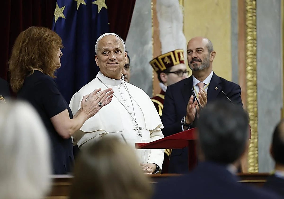 Pope Leo XIV receives seven-minute standing ovation following his speech in the lower house