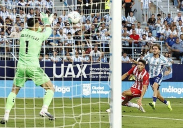 Malaga's Adrián Niño, right, had the best chances on Sunday night.