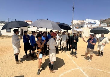 Director Paco Torres lead actress Zoe Bonafonte (wearing a red cap) on set in Torrox.