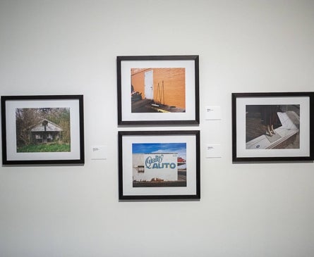 Imagen secundaria 1 - Some of the photos on display at MEET, together with a photo of the author.