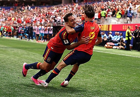 Oyarzabal is congratulated by Gavi after scoring his second goal of the game.