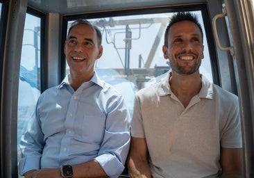 The mayor and a representative of Leisure Parks on the cable car.