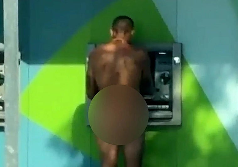 Viral video shows naked man using cash machine in Malaga