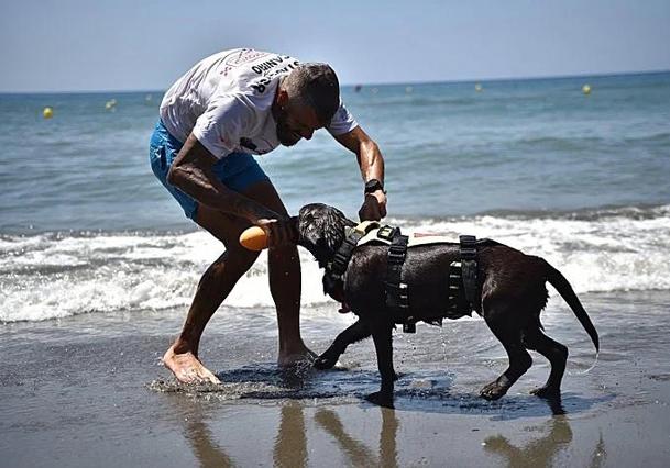Miguel training his dog