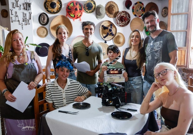Adam Mason with his production team.