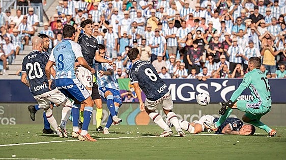 Chupete follows up his missed penalty, but gives away a foul.