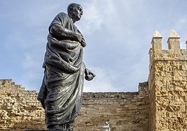 The statue of Seneca the Younger next to the castle in the city of Cordoba.