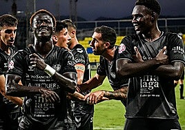 Moha Bassele and Destiny celebrate the equalising goal on Saturday.