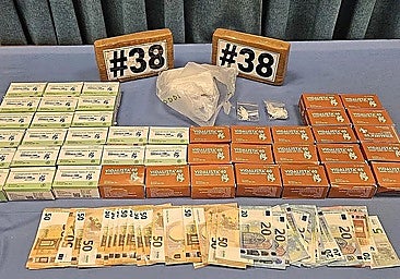 The boxes containing the Viagra tablets, the drugs and the money that were seized.
