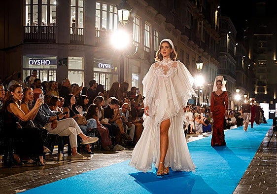 Some of the models on the blue catwalk on Friday night.