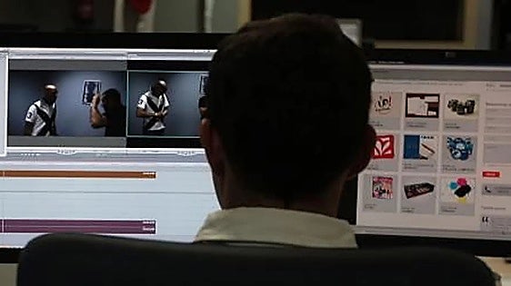 A developer works on his computer amid a shortage of technical talent in the digital sector.
