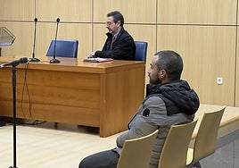 The man convicted of attempted murder, and his defence lawyer, Efraín Latorre.