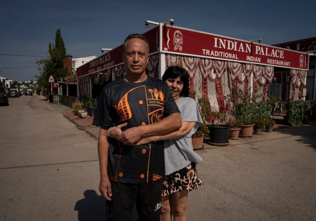Sarbjit Singh Kaur and Guadalupe Molina, in front of their restaurant.