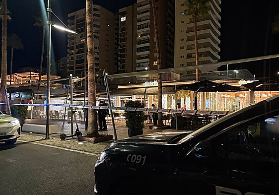 Police at Muelle Uno following the latest shooting.