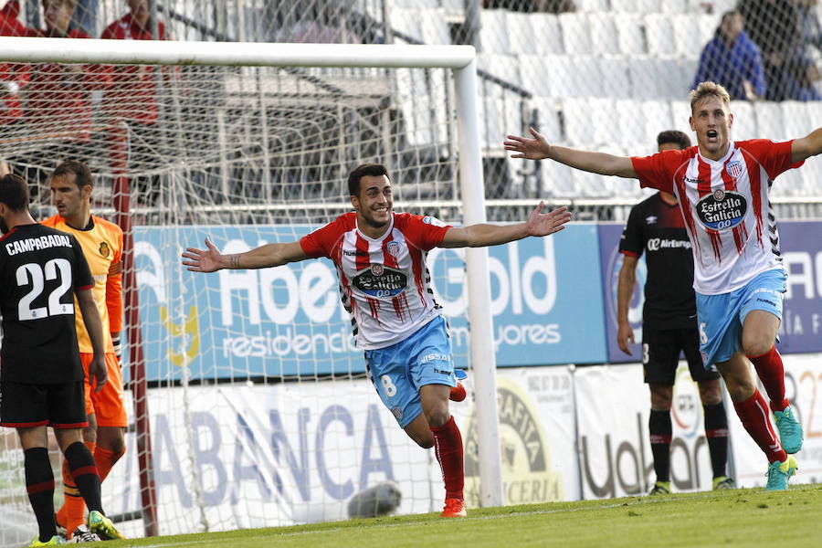 Joselu, centre, celebrates scoring for Lugo.