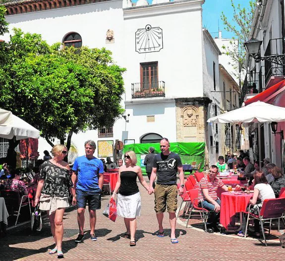 Tourists discovering the centre of Marbella old town.