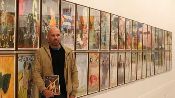 Peter Doig with his 166 painted film posters at the CAC, Malaga