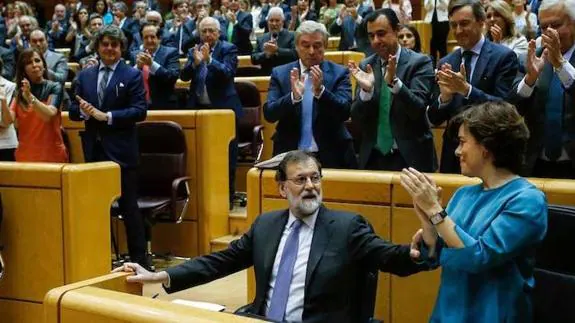 Rajoy applauded in Spain's upper house.