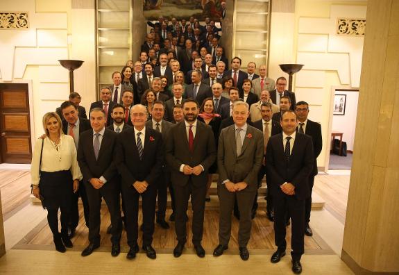 Guests posed for a photo after the dinner at Clothworkers Hall. 