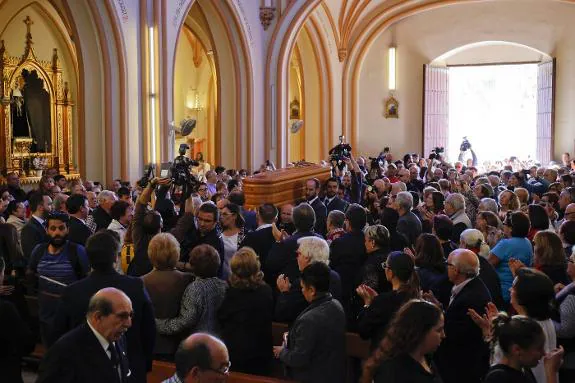 Crowds turned up for the funeral in the church in La Trinidad on Sunday. 