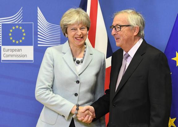 Theresa May and Jean-Claude Juncker.