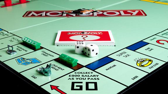 Monopoly being played on the traditional London-based board.