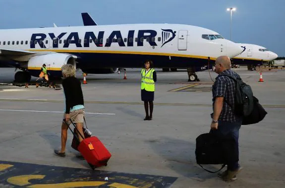 Passengers boarding a Ryanair flight.