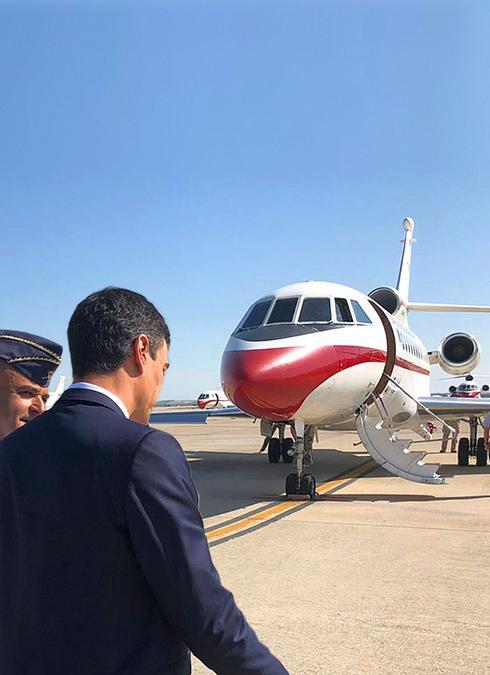 The Prime Minister about to board the controversial jet. 