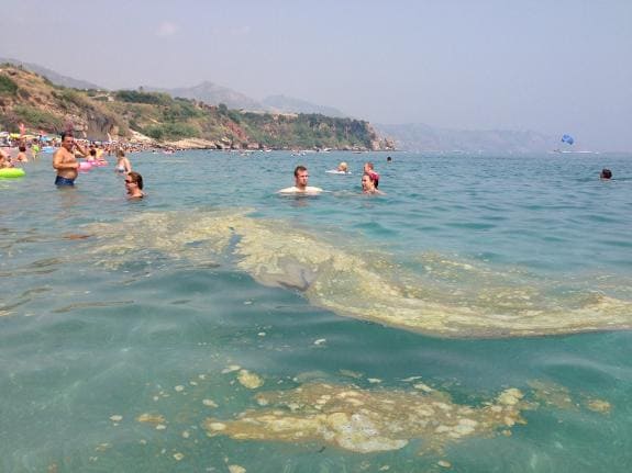 A file photograph of pollution in the water on Burriana beach in Nerja.