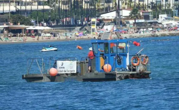 One of the cleaning boats operating off the coast in Marbella.