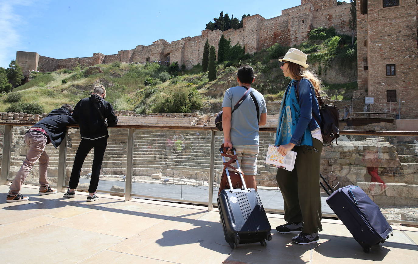 Tourists at Malaga's Roman theatre.