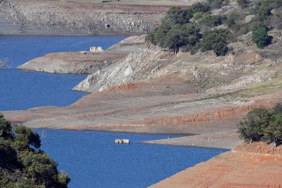 Water levels have dropped to reveal the roofs of old houses in La Concepción reservoir near Marbella.